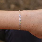Sterling Silver bracelet with rectangle-shaped cubic zirconia birthstones, separated white cubic zirconia circle stones (2.5 mm)
