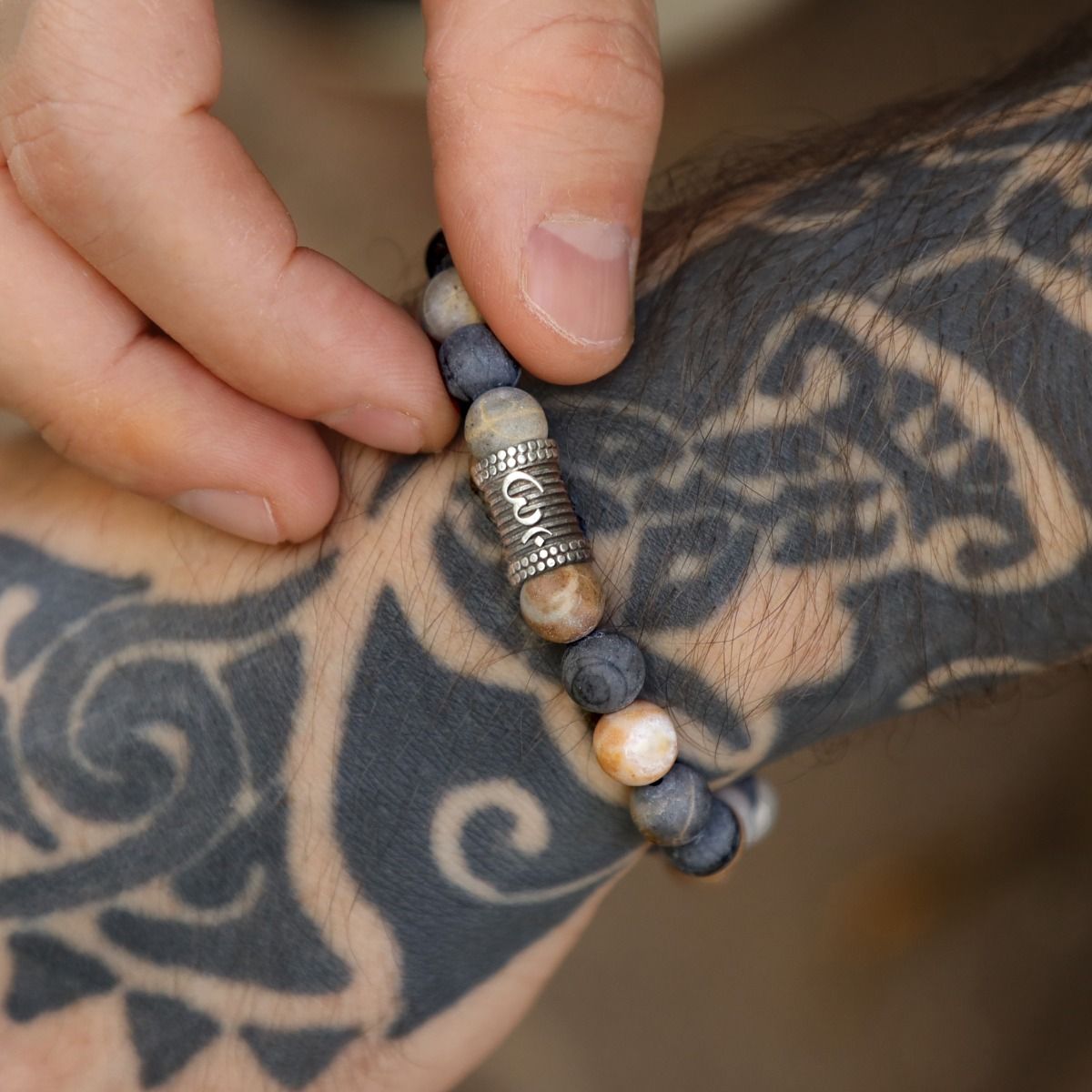 Om Herrenarmband aus Picasso Jaspis