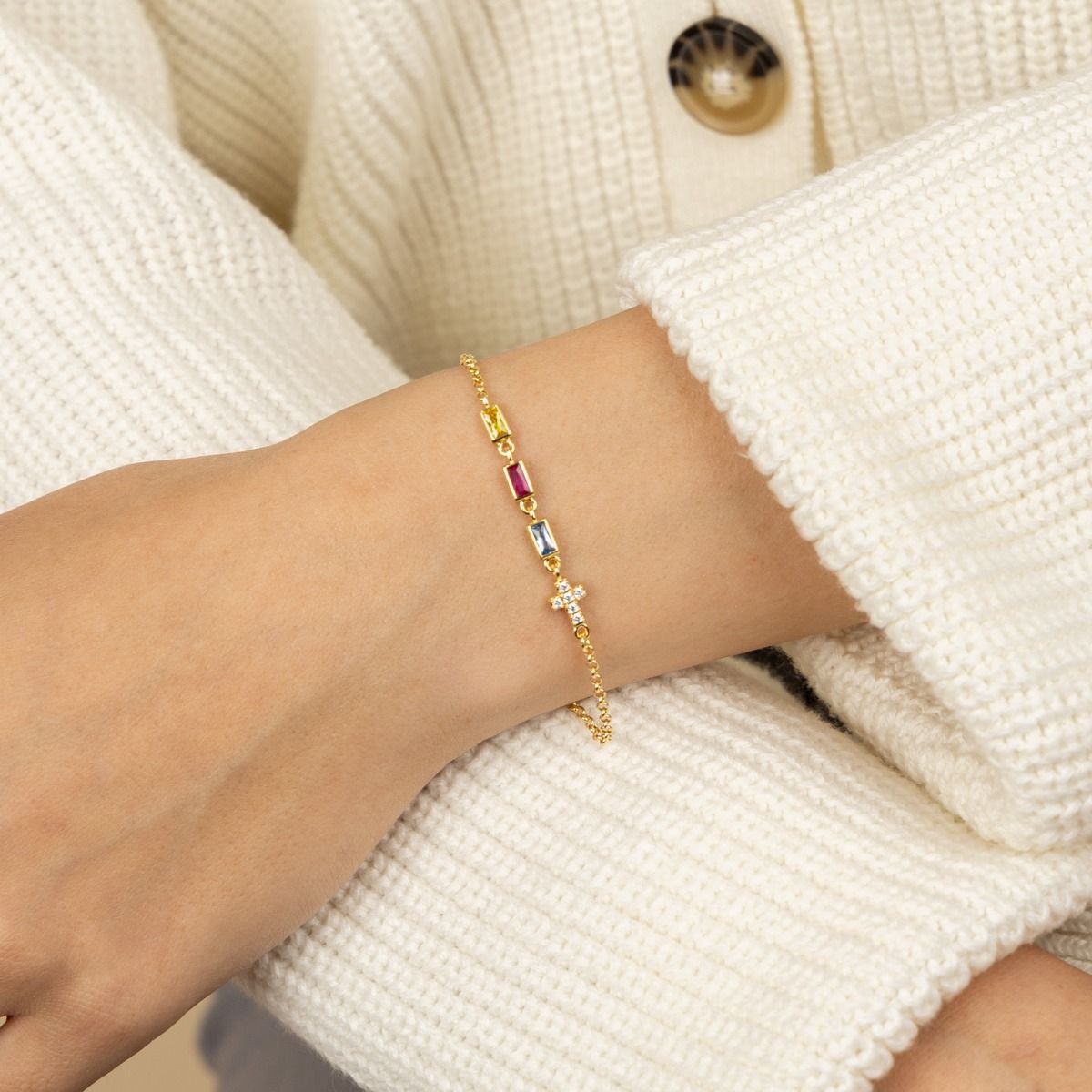 Gold cross bangle bracelet top