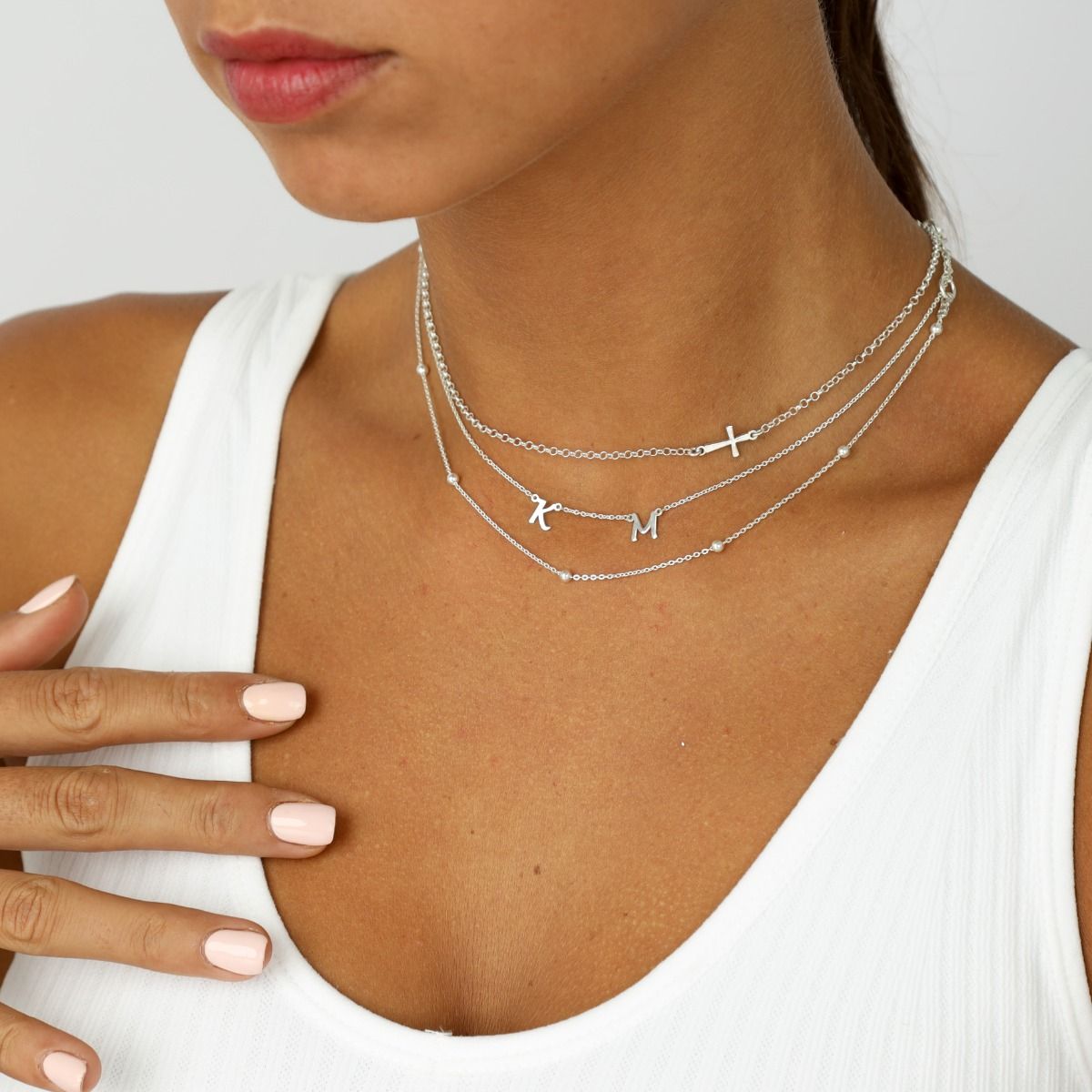 Silver sideways cross necklace – Rose Burkhardt Jewelry