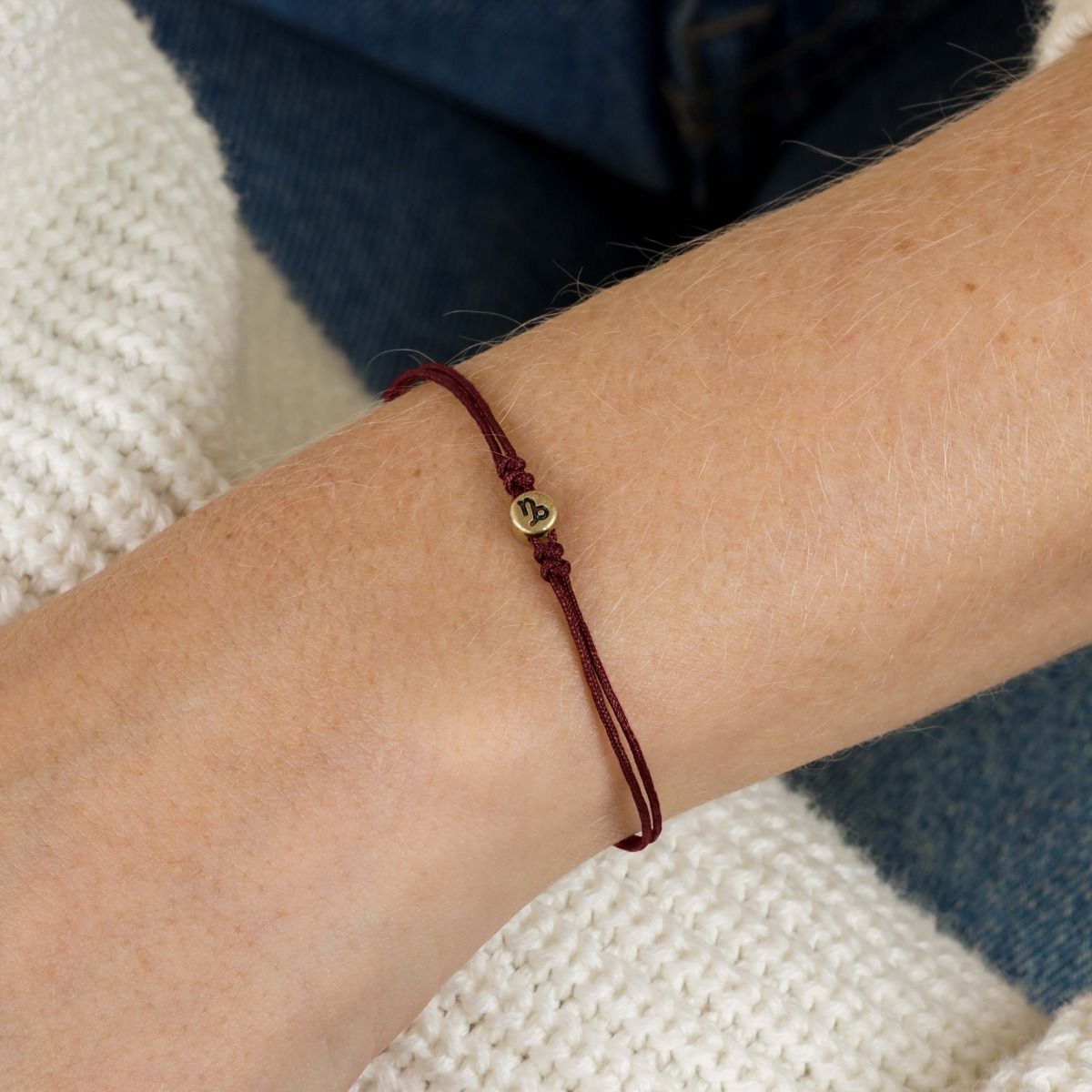 Red string hotsell bracelet with gold