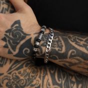 Combination of curb chain bracelet and beaded bracelet with onyx stones