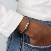 Gray Suede bracelet with Sterling Silver engraved charms. 