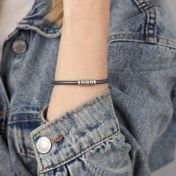 Women's bracelet with Sterling Silver engravings and gray suede wristband 