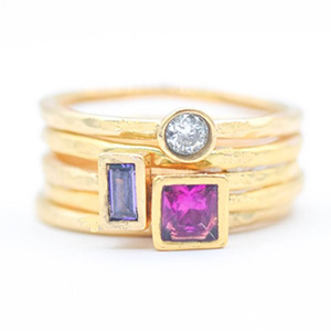 carina rings in gold with gem stones