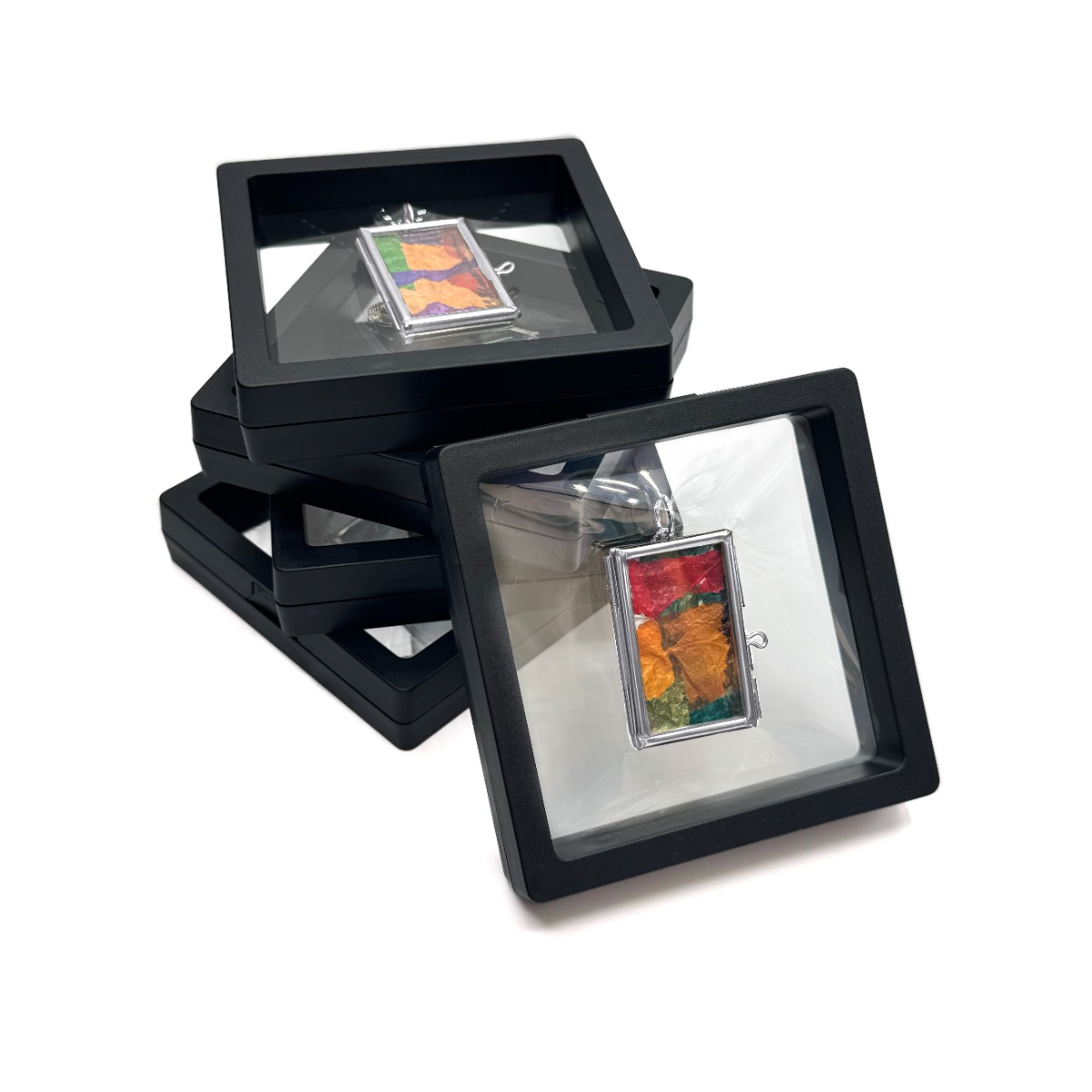 Aura Fragment Locket in its transparent display box